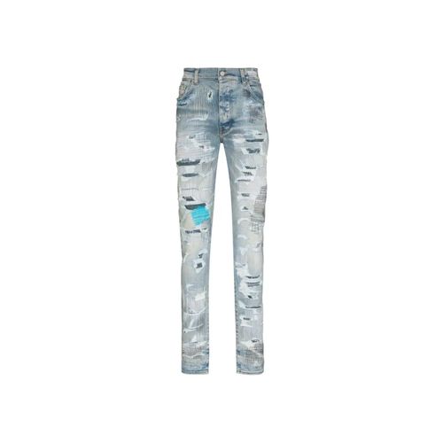 AMIRI Distressed Finish Ripped Skinny Jeans Light Indigo Blue for Men